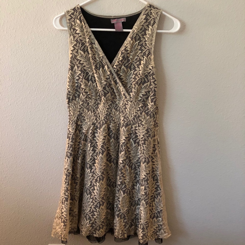 Tan and black v-neck dress